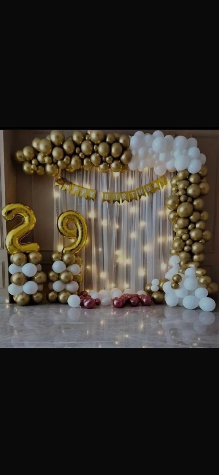 29th birthday decoration with white and golden balloon decoration 