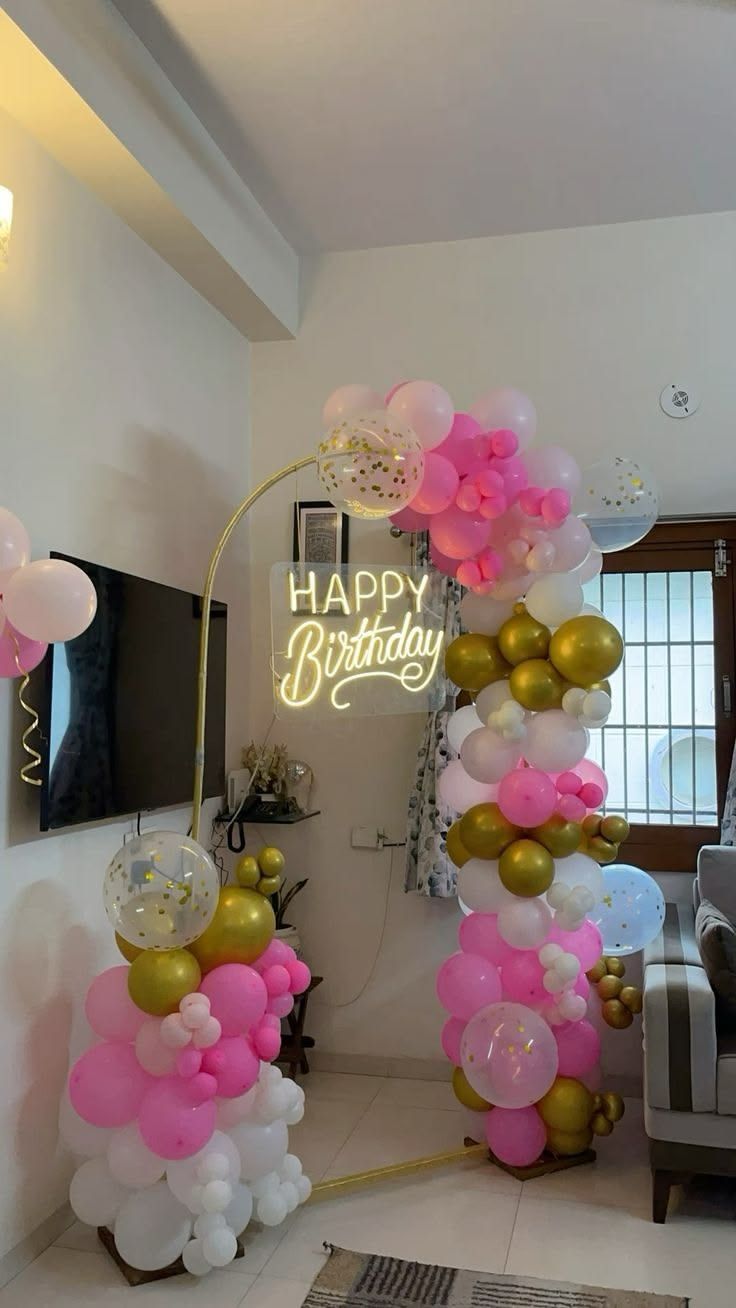 White, pink, golden balloon decoration 