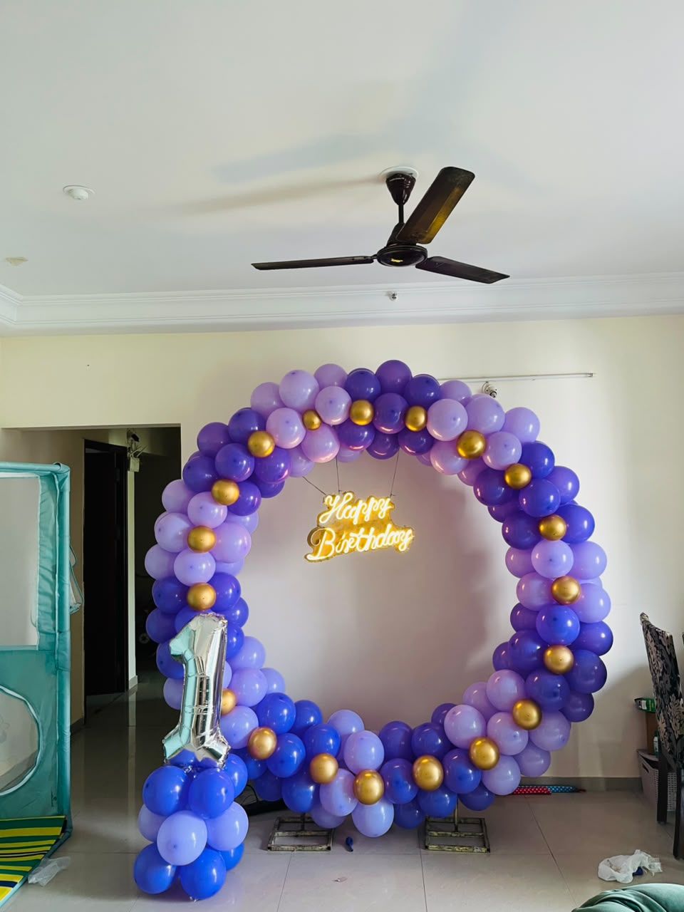 1st birthday decoration ring with purple and golden colour balloon 