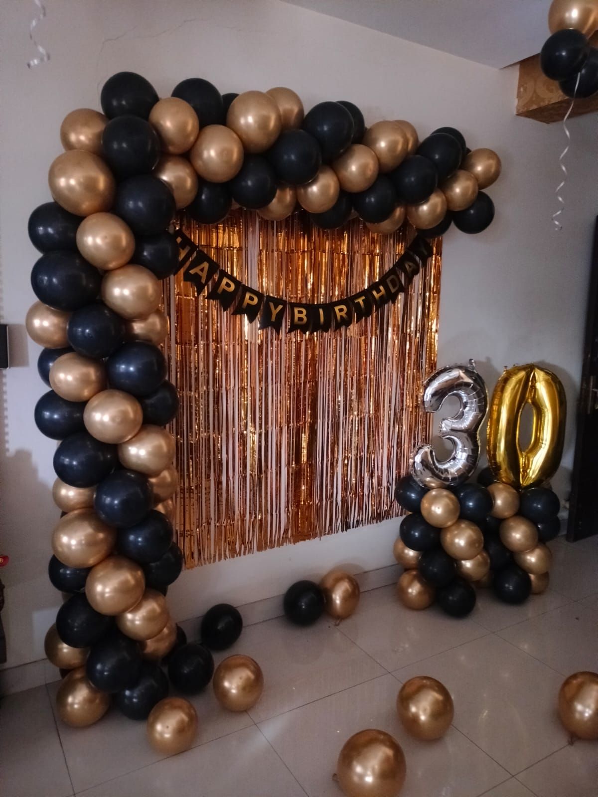 30th birthday decoration with black and golden balloon decoration 