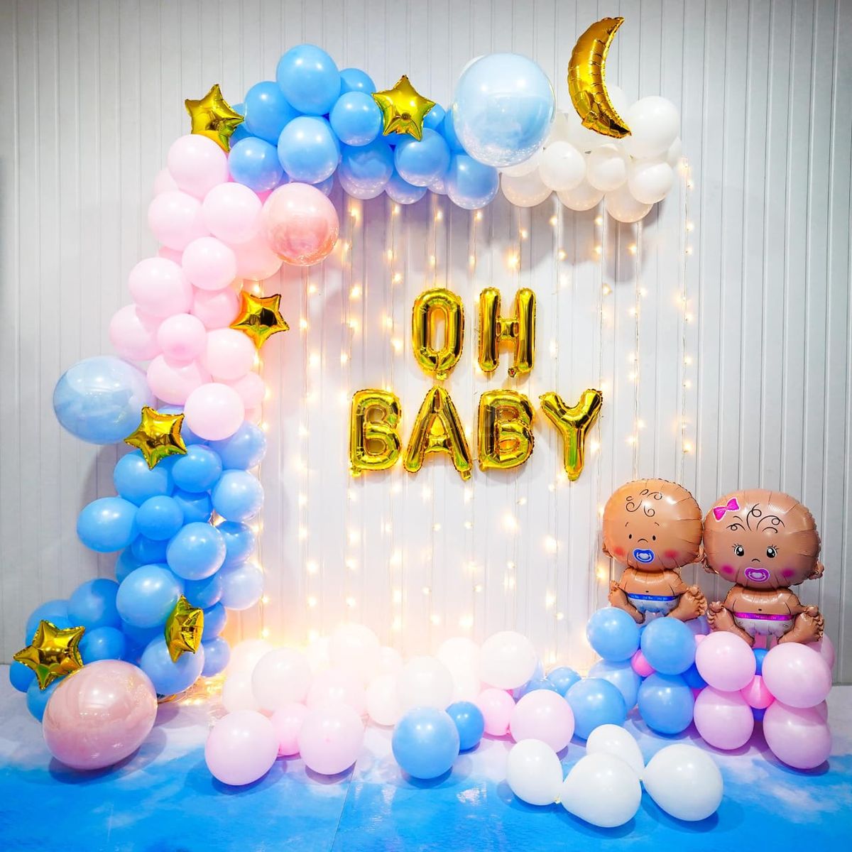 Oh baby arch on wall with ferry light 