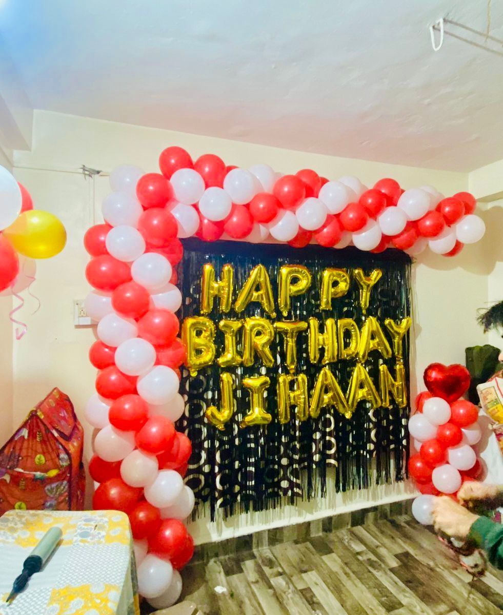 Red and white balloon arch 