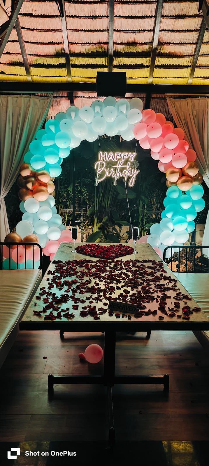 Ring stand balloon decoration with rose petals 