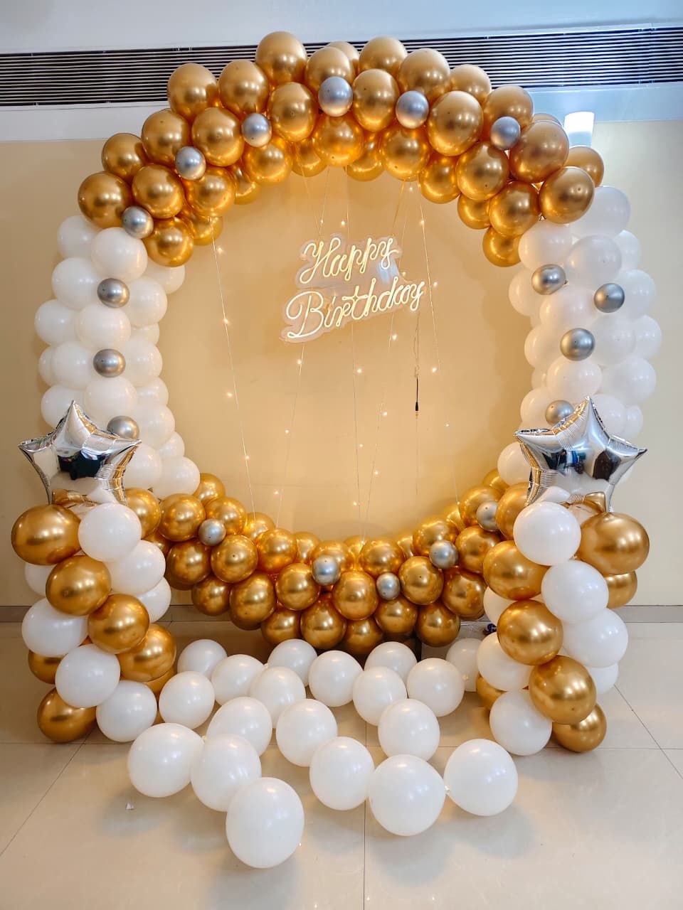 Golden and white balloon decoration 