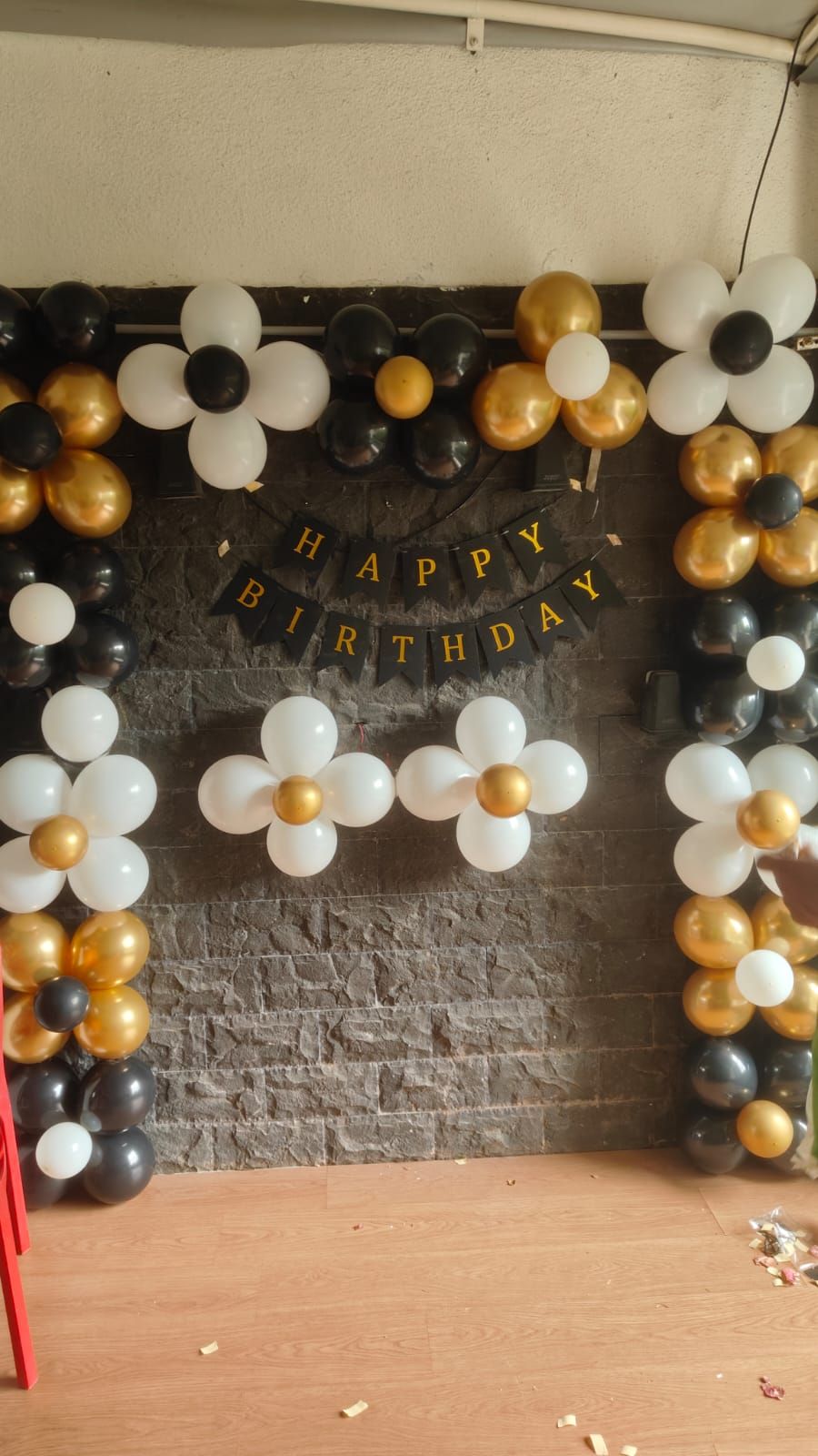 White, black and golden balloon decoration 